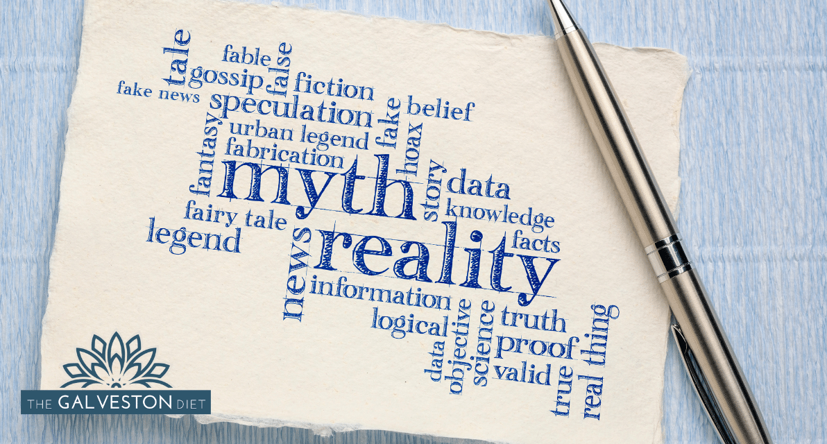 Scrap of paper with "myth" and synonyms for myth written in serif font with a blue pen.